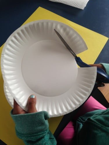 cutting up african paper plate necklace